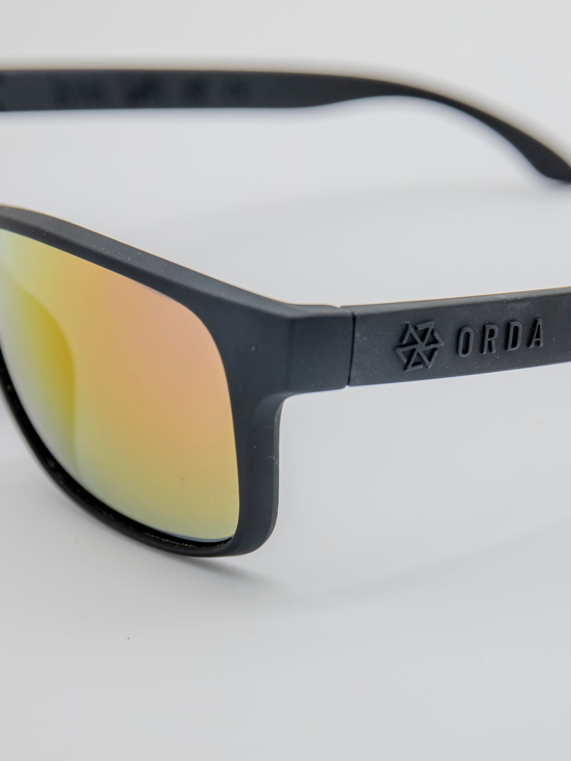 ORDA Jesse Jude – Black Velo Grip Frame with Mirrored Red/Gold Chromo Vue™ Lens Sunglasses