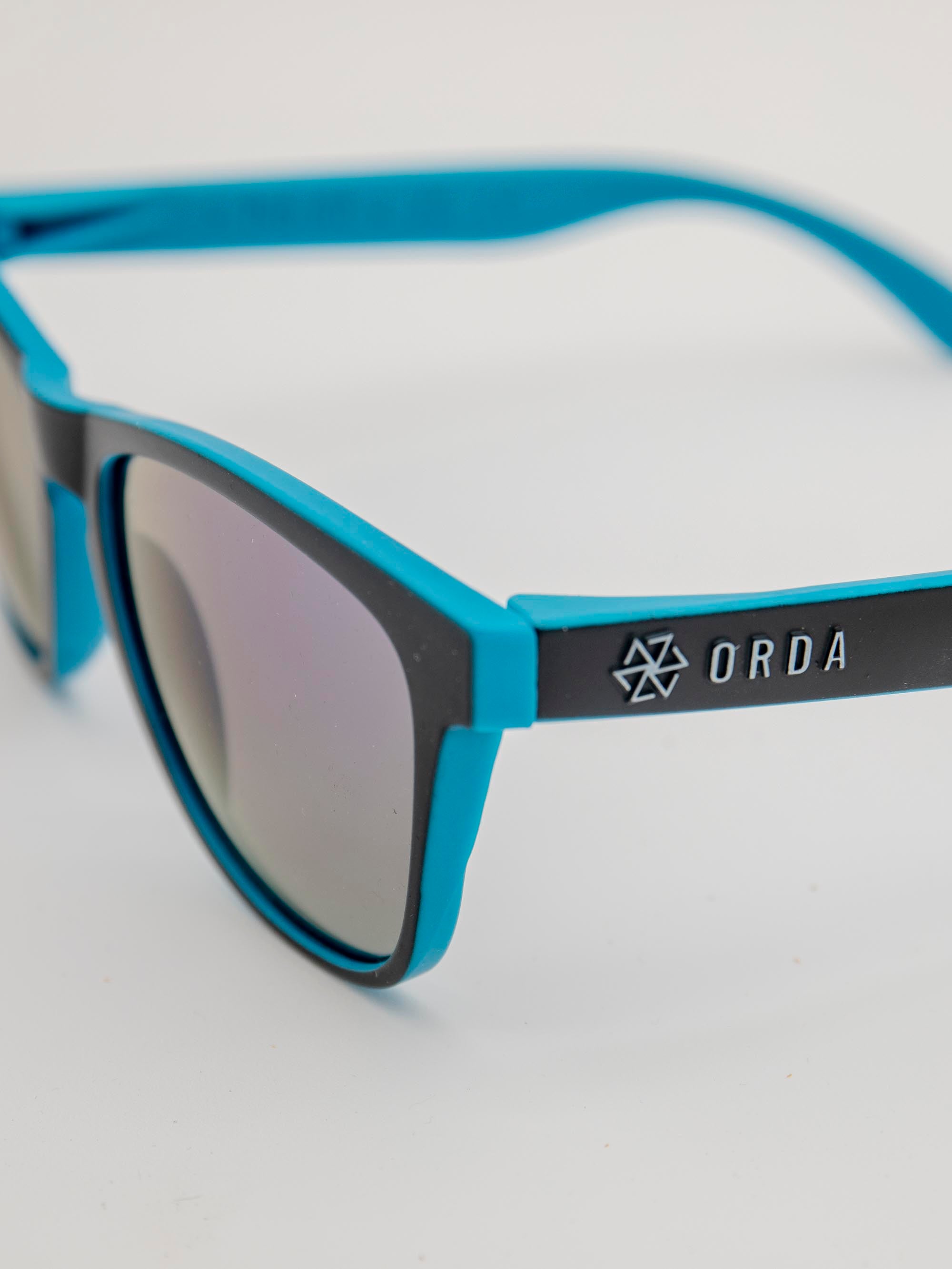 ORDA The MT – Black Outer / Blue Inner Two Tone Lux Frame with Mirrored Blue Chromo Vue™ Lens Sunglasses