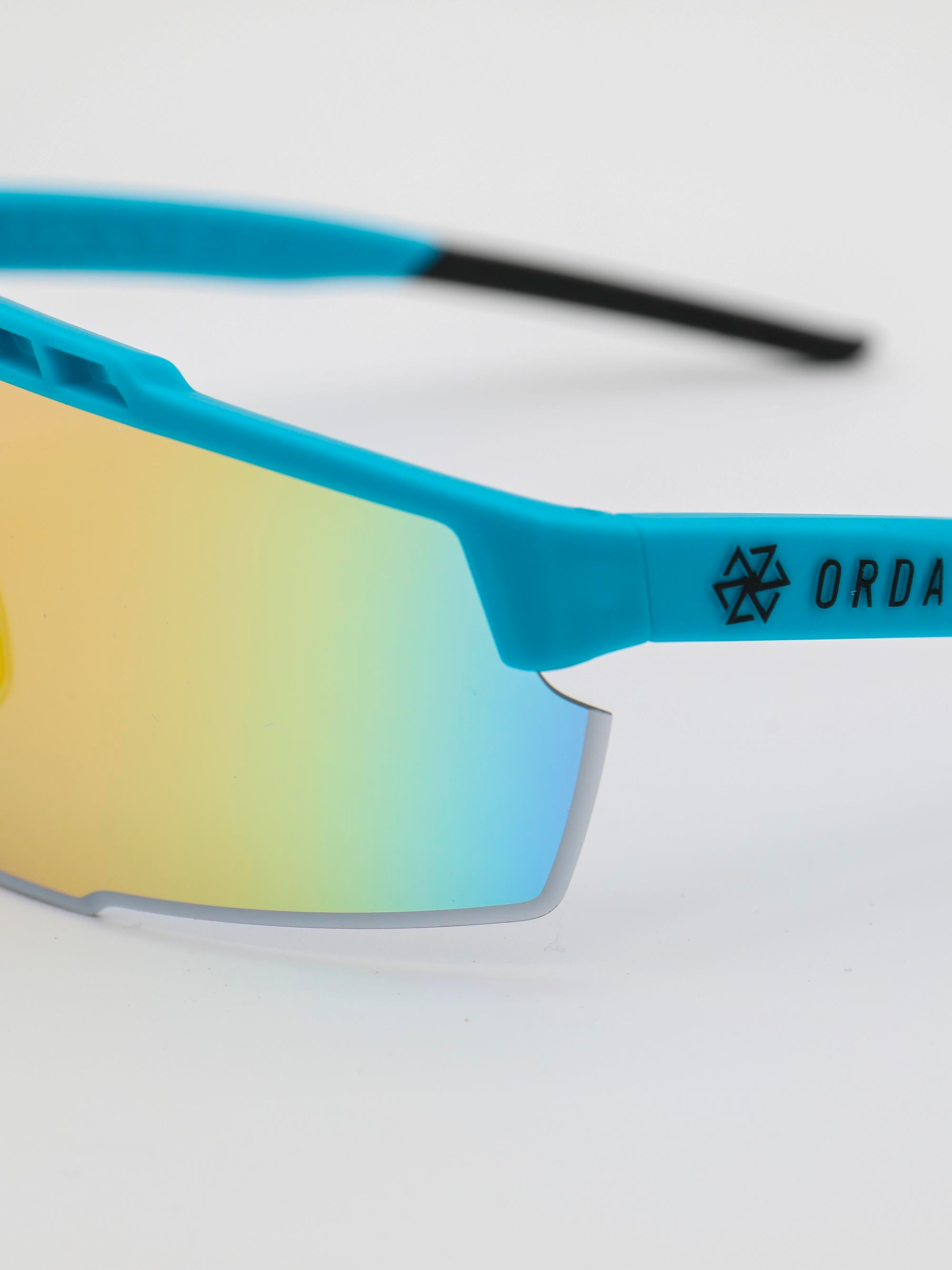 ORDA Benni – Blue Velo Grip Frame with Revo Red/Orange Chromo Vue™ Lens Sunglasses