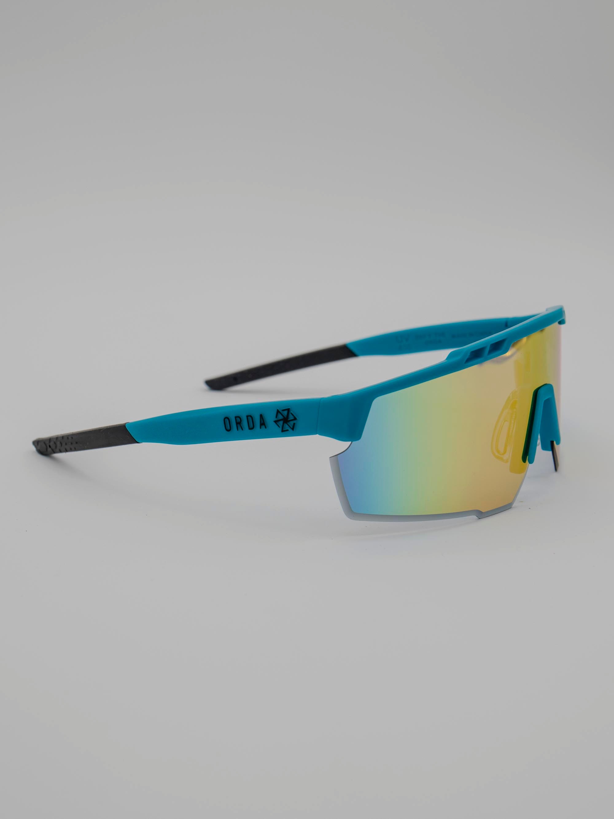 ORDA Benni – Blue Velo Grip Frame with Revo Red/Orange Chromo Vue™ Lens Sunglasses