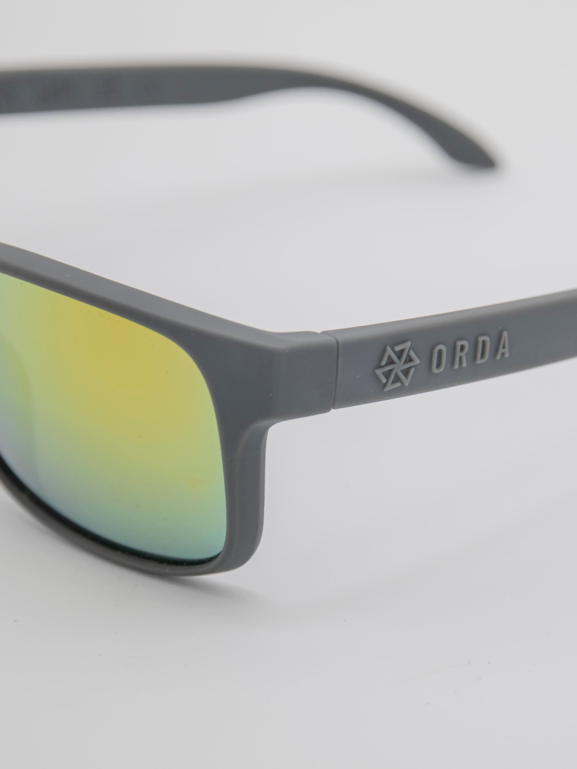 ORDA Jesse Jude – Grey Velo Grip Frame with Mirrored Red/Gold Chromo Vue™ Lens Sunglasses