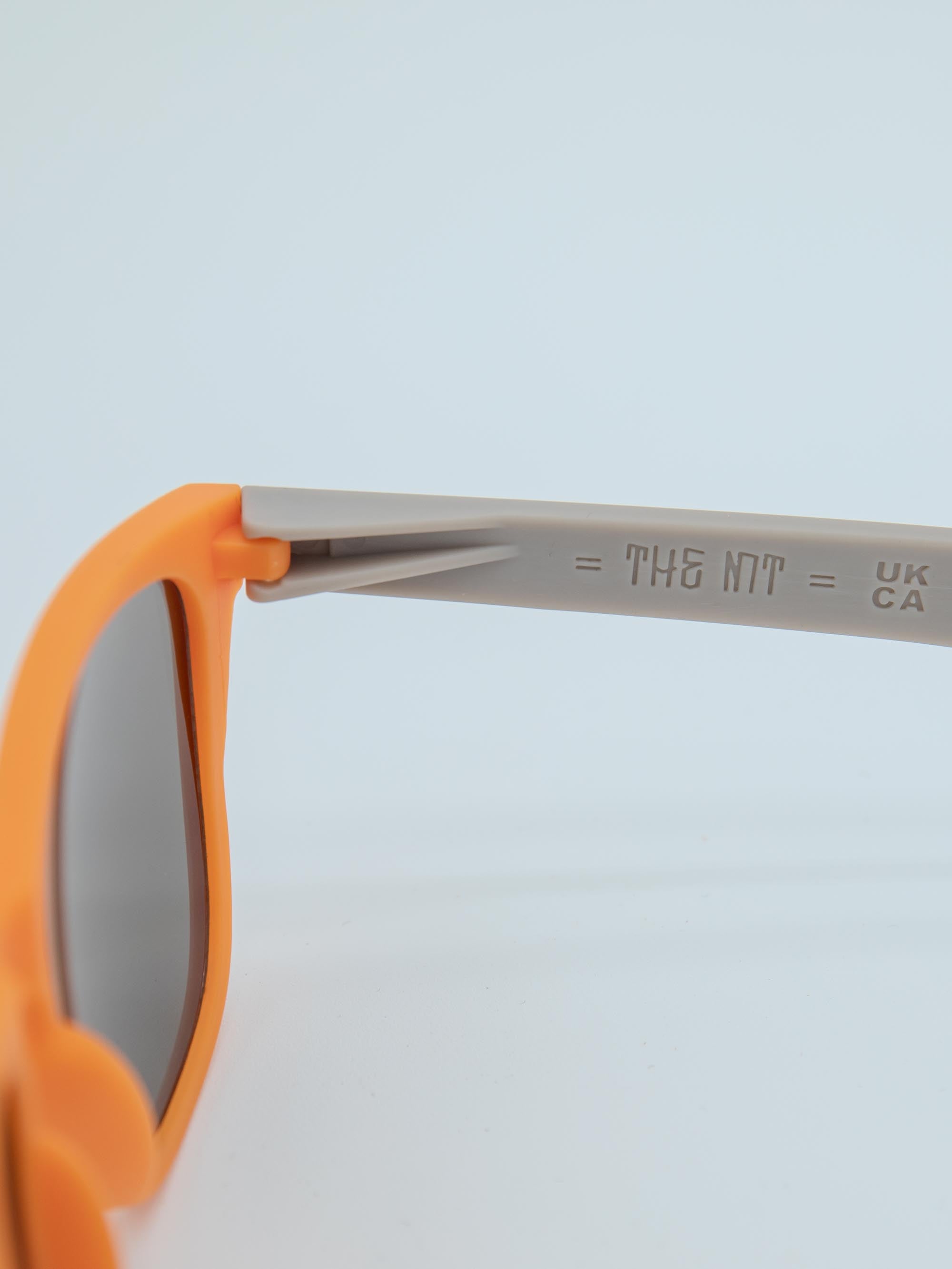 ORDA The MT – Grey / Orange Velo Grip Frame with Mirrored Blue Chromo Vue™ Lens Sunglasses