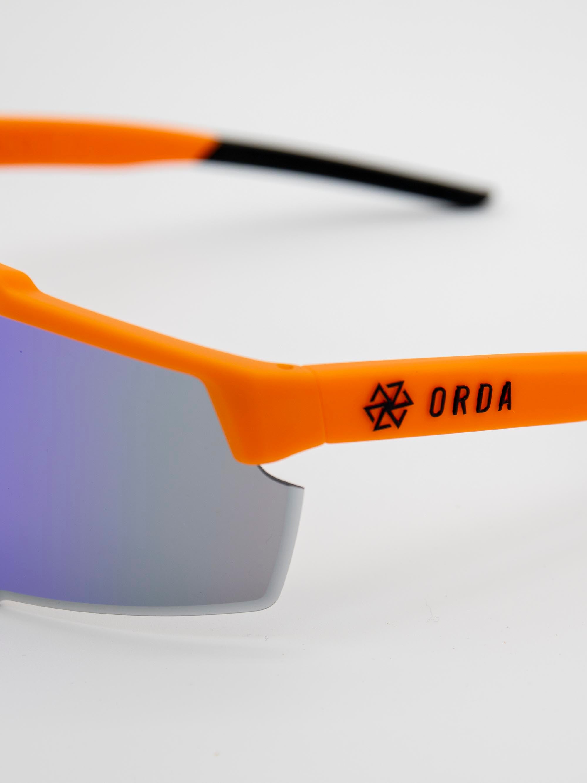ORDA Benni – Orange Velo Grip Frame with Revo Blue Chromo Vue™ Lens Sunglasses