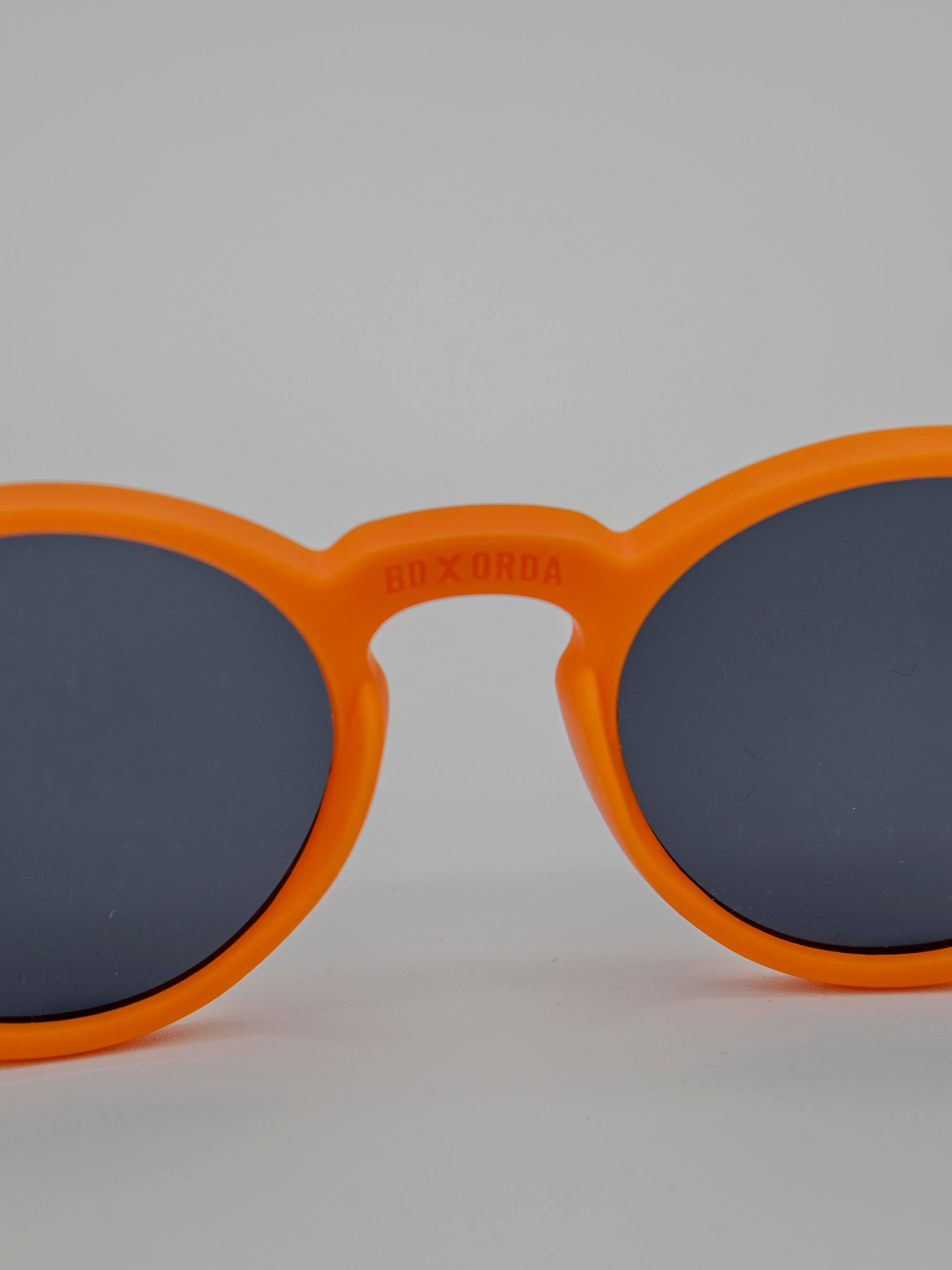ORDA BD Classic – Orange Velo Grip Frame with Black Haze Chromo Vue™ Lens Sunglasses