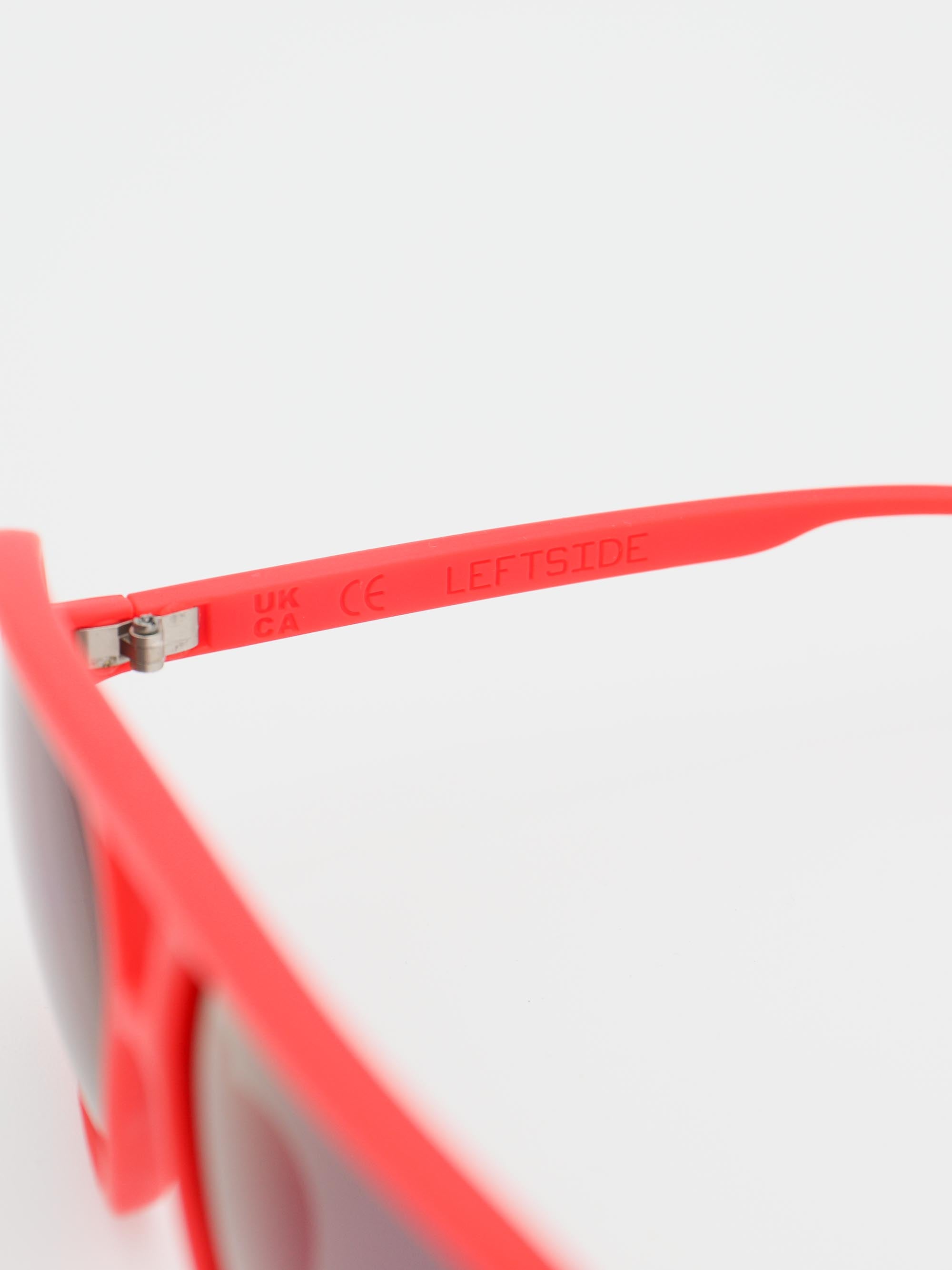 ORDA Leftside – Red Velo Grip Frame with Mirrored Purple Chromo Vue™ Lens Sunglasses